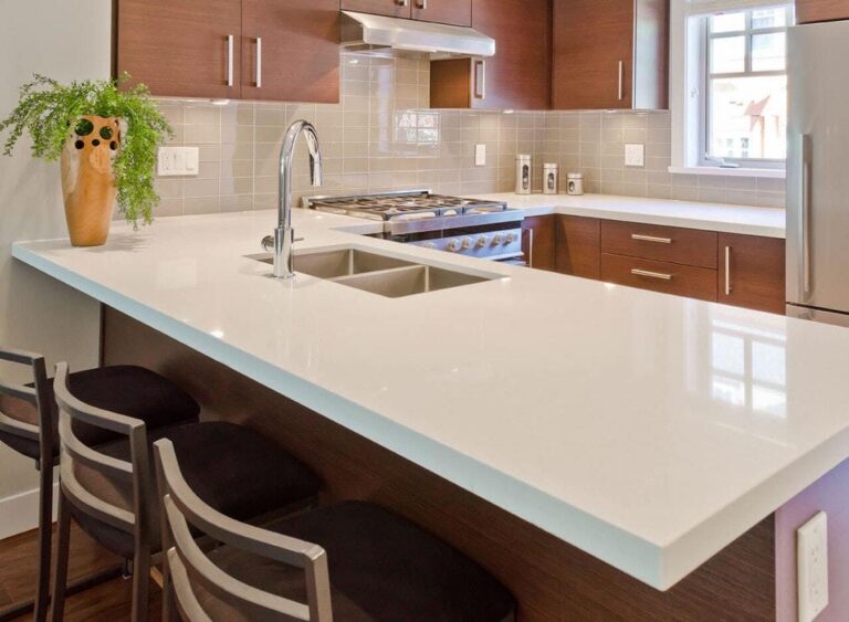 Read more about the article How Do Custom Quartz Countertops Enhance Your Kitchen Design?